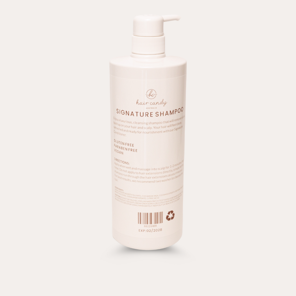 Shampoo bottle with pump on a white background